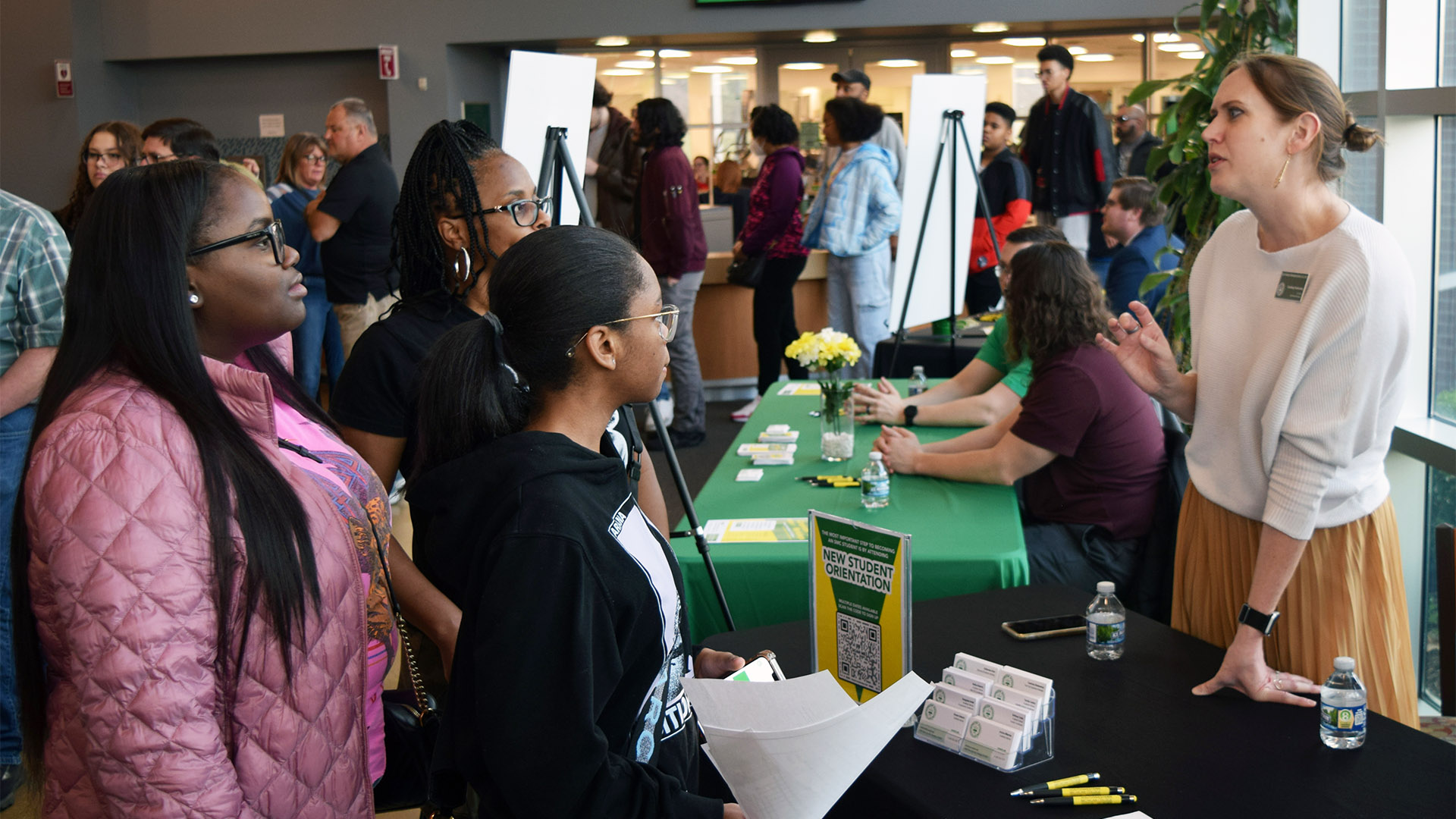 Prospective students learning about SMC at the Open House.