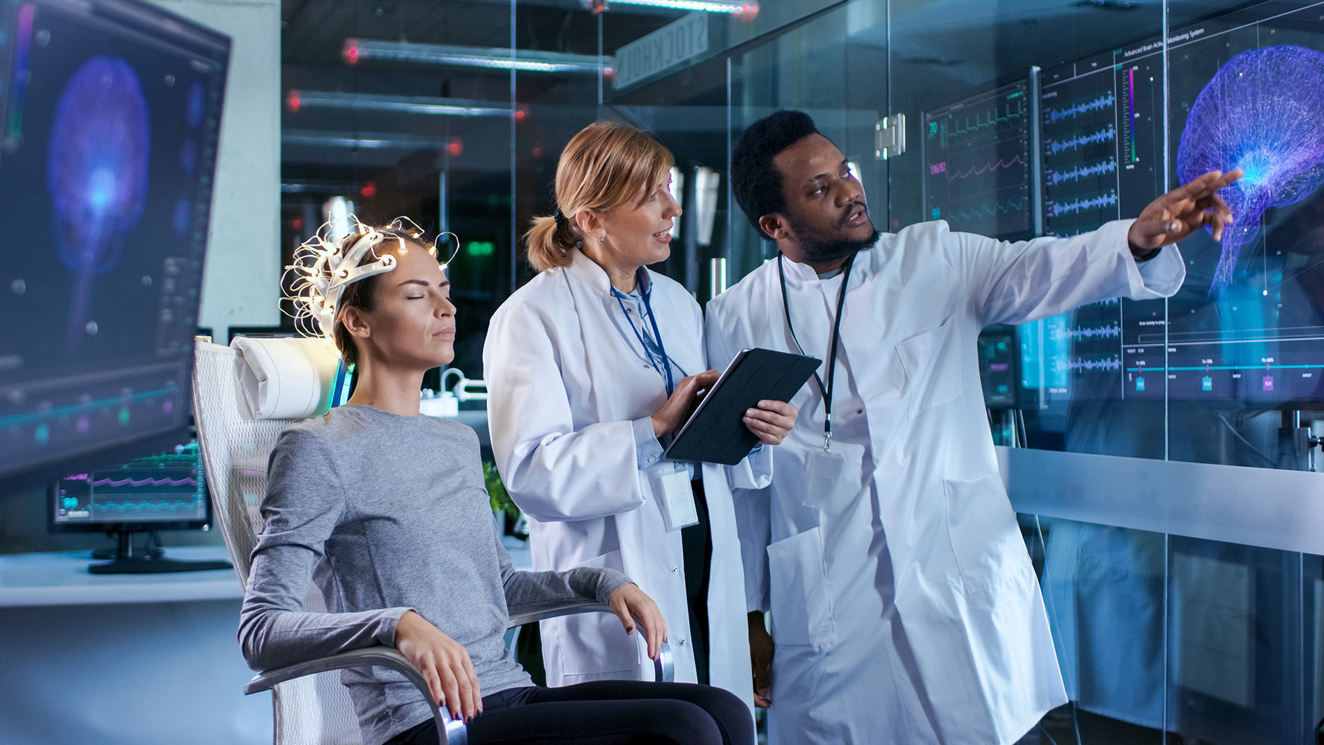 Health professionals performing an EEG