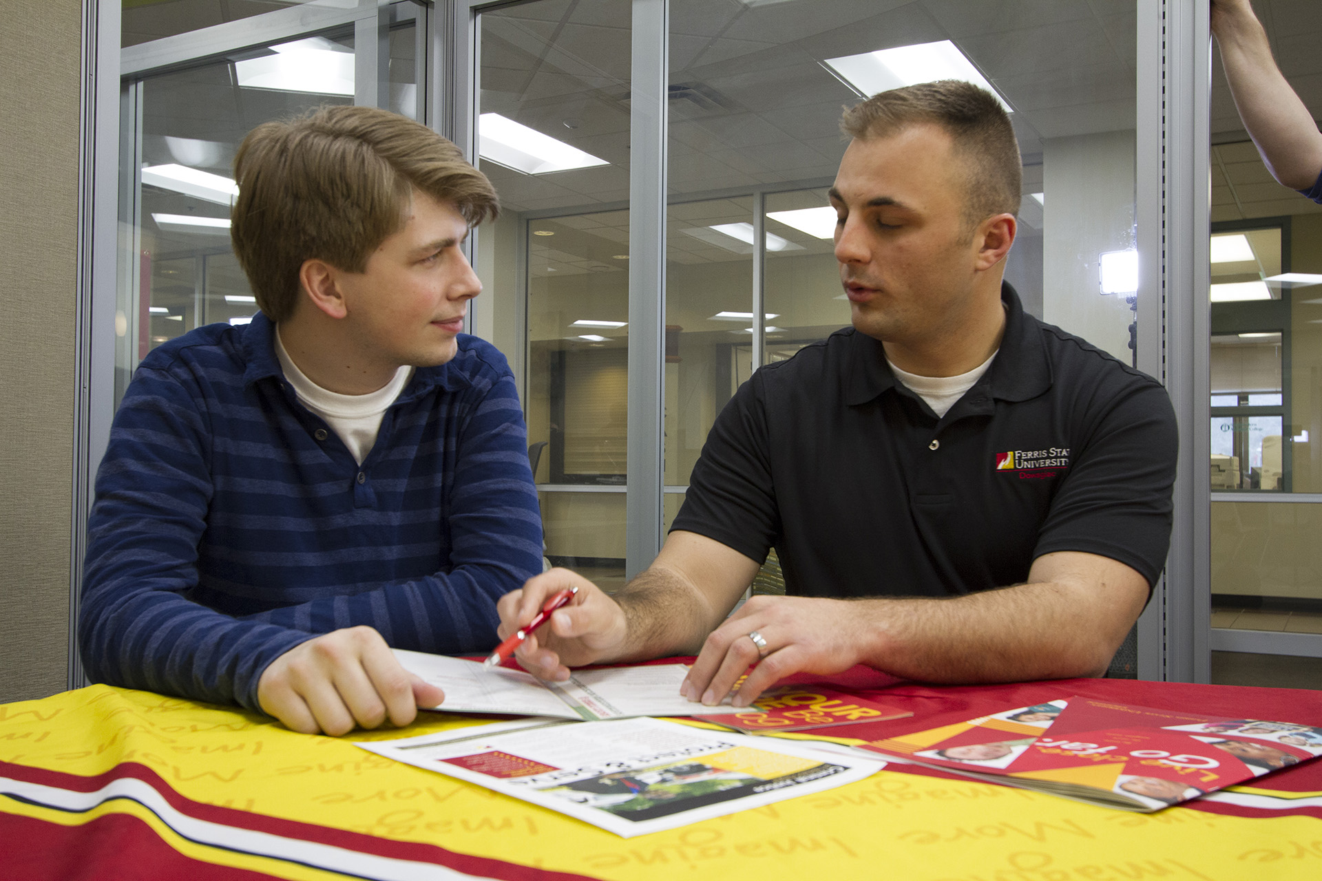 A Ferris State University transfer advisor meets with a student