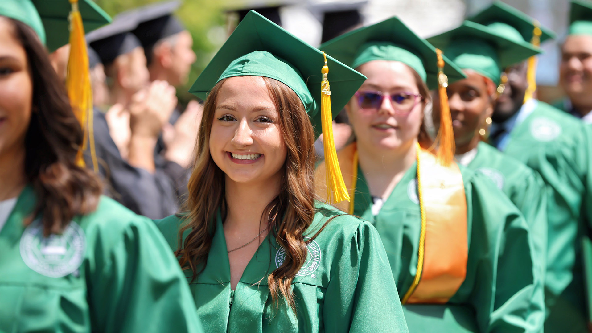 Students are excited to celebrate their graduation.