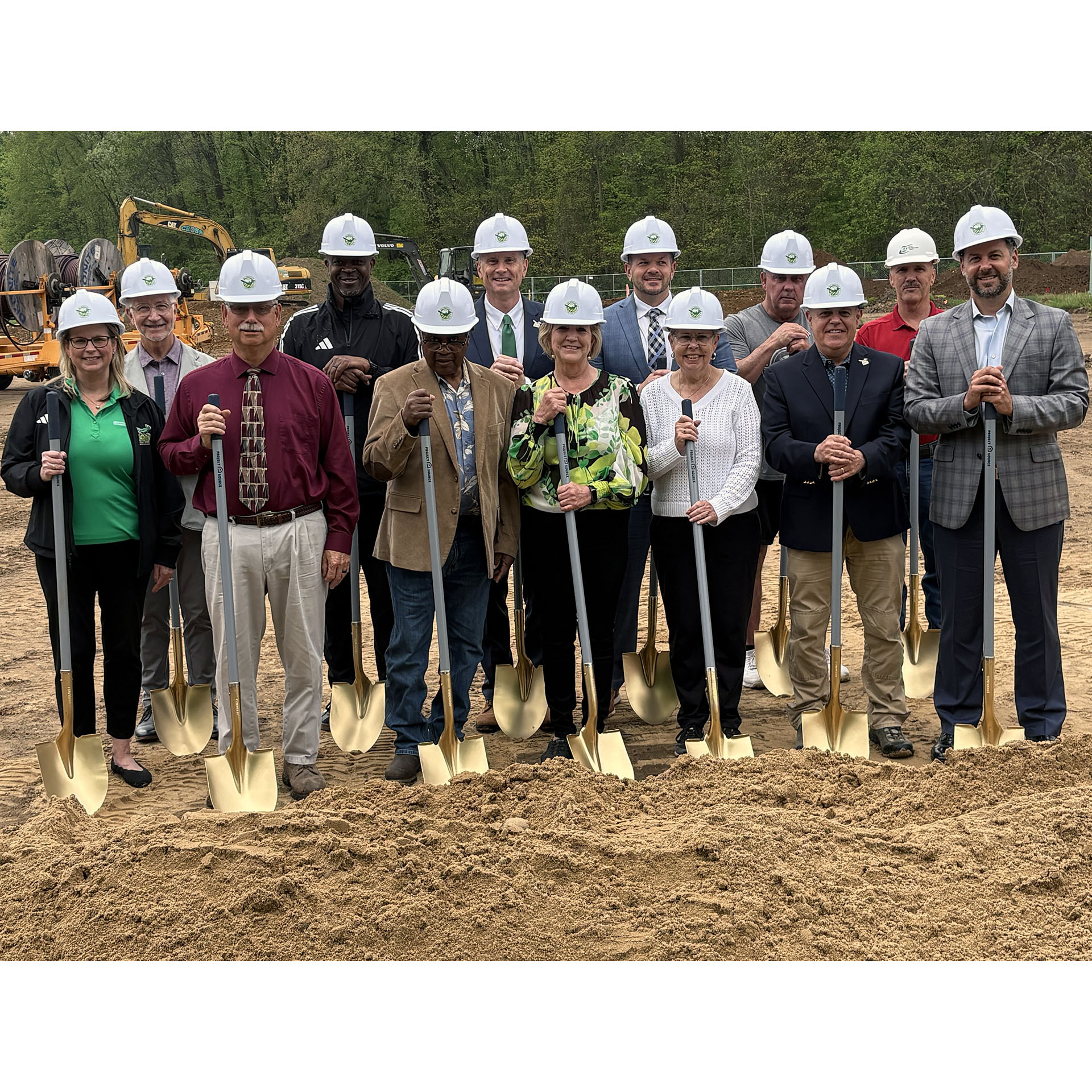 Board of Trustees with shovels