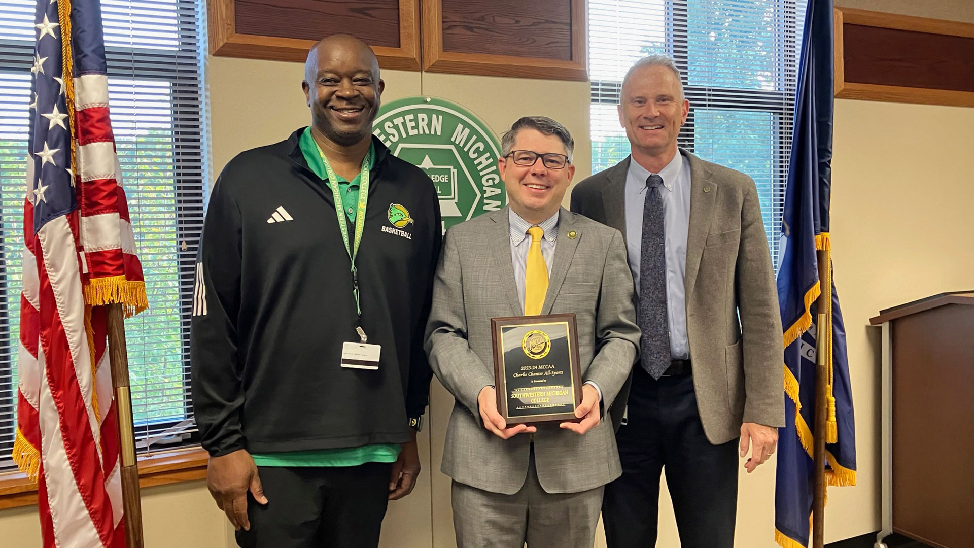 Athletics Director Rodell Davis, President Dr. Joseph Odenwald, and Chief Marketing Officer Mike O'Brien