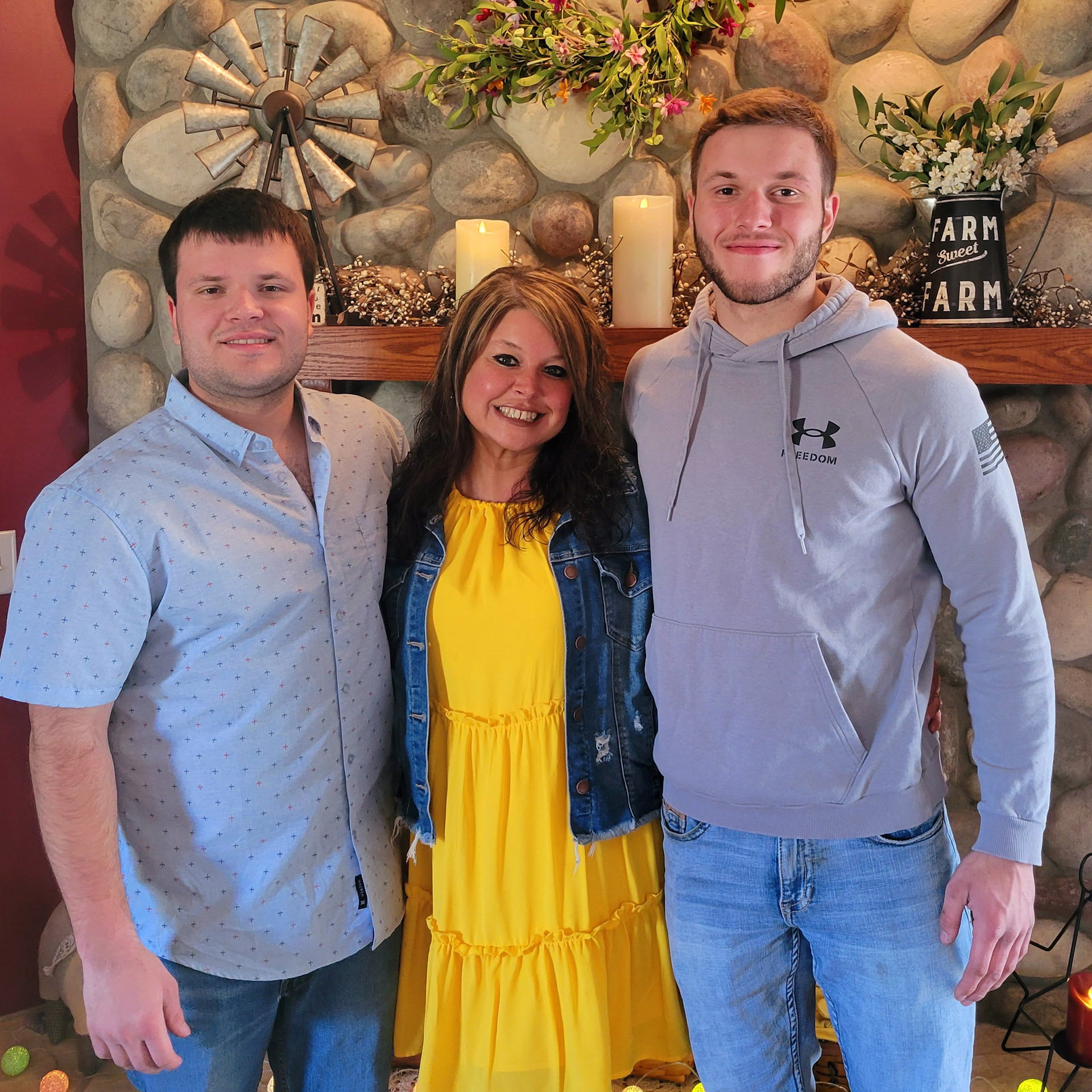 Connor and Carter tower over their mom
