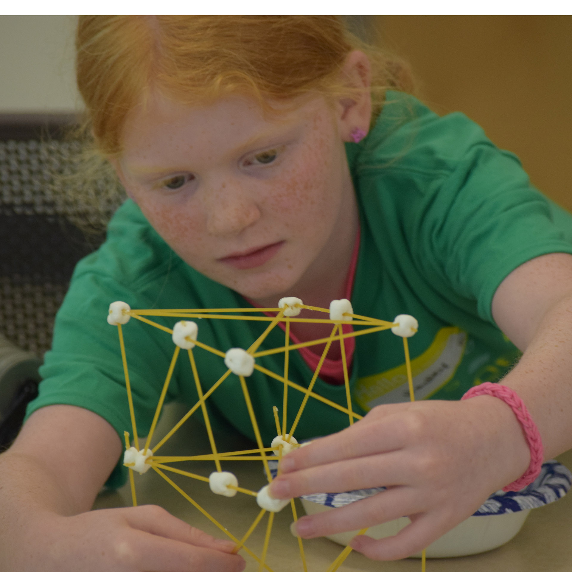 Engineering a load-bearing tower with spaghetti, marshmallows