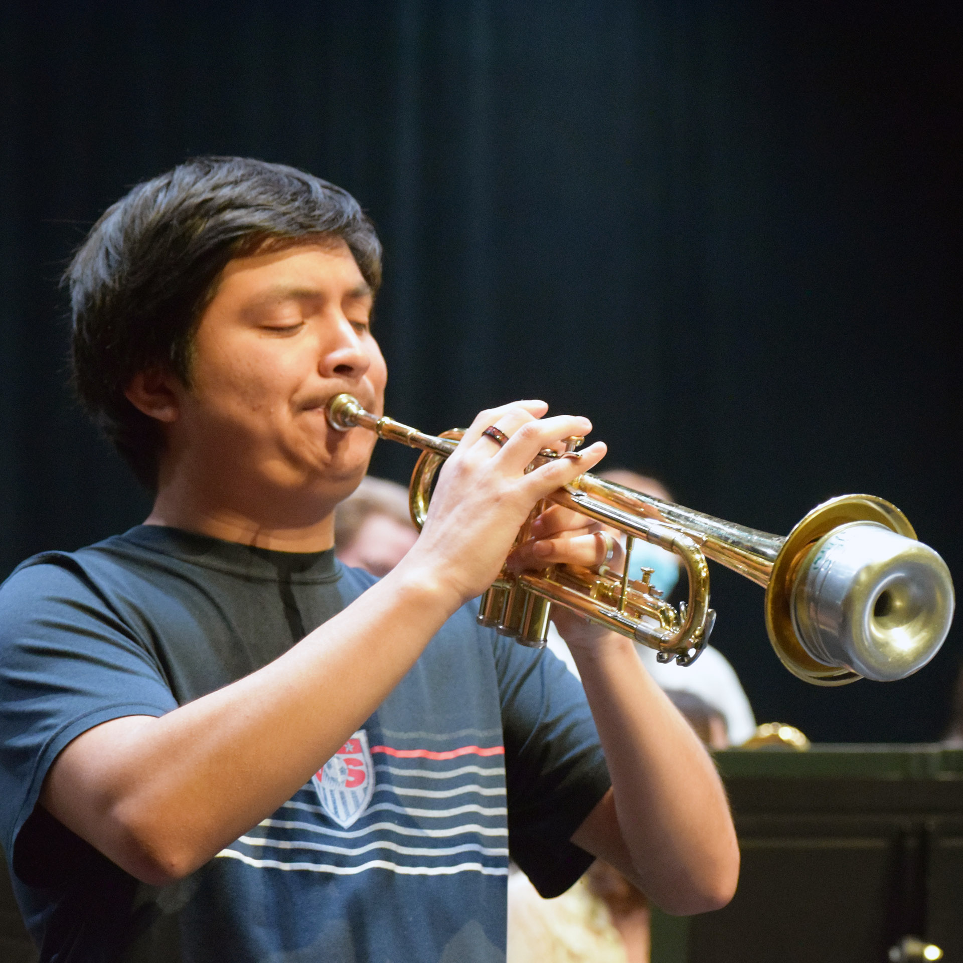Juan Garcia, Bangor, steps out front for a trumpet solo