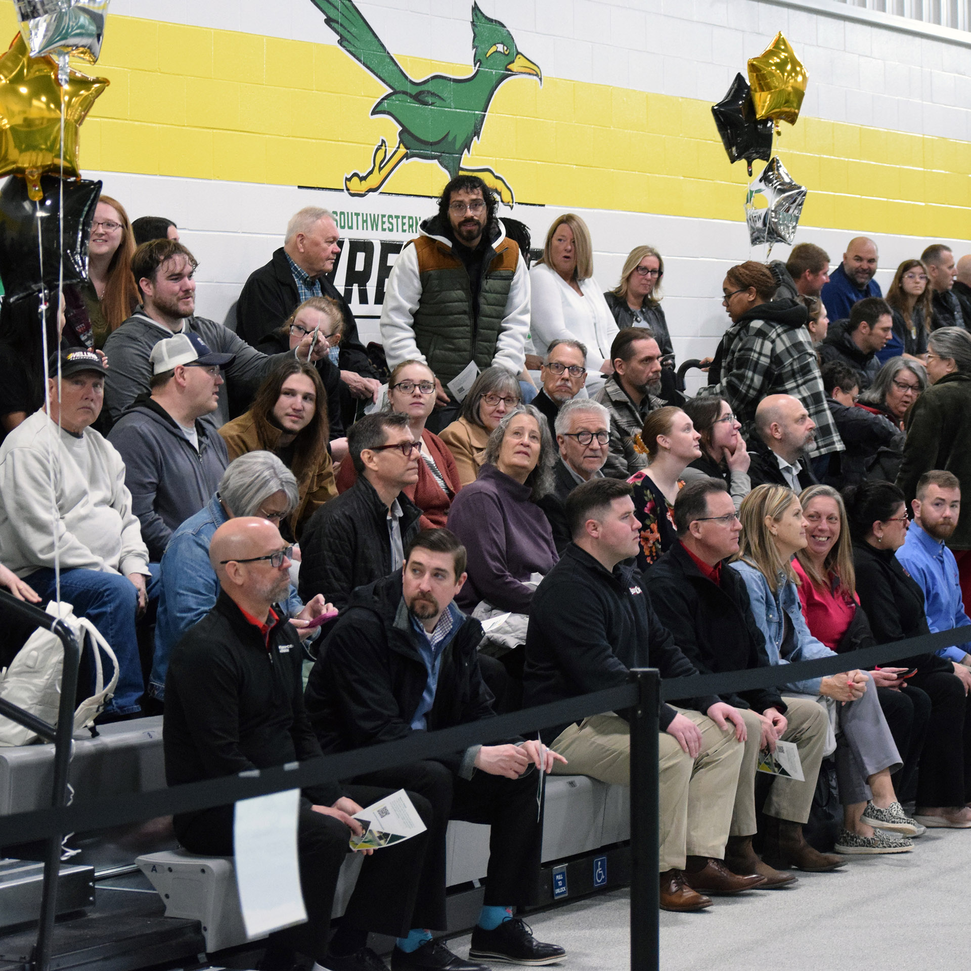 Wrestling bleachers packed for opening